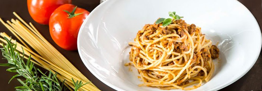 Immagine esemplificativa di un piatto tradizionale Italiano come quelli preparati alla Spaghetti in the family: scuola di cucina a Ponte Tazio.